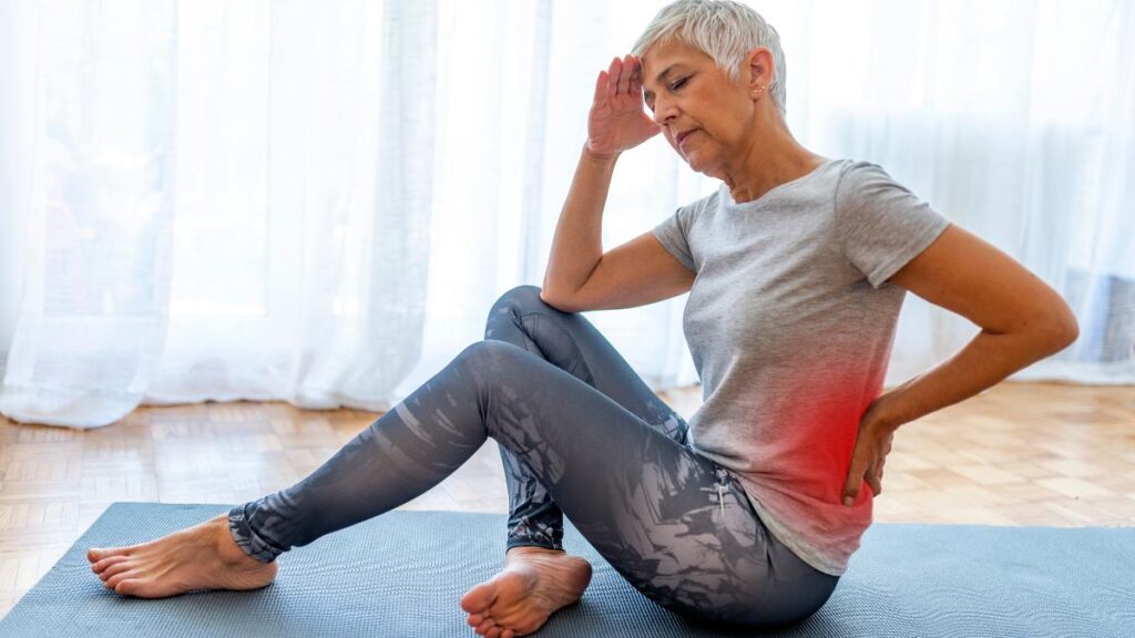 Women doing pilates with back pain 